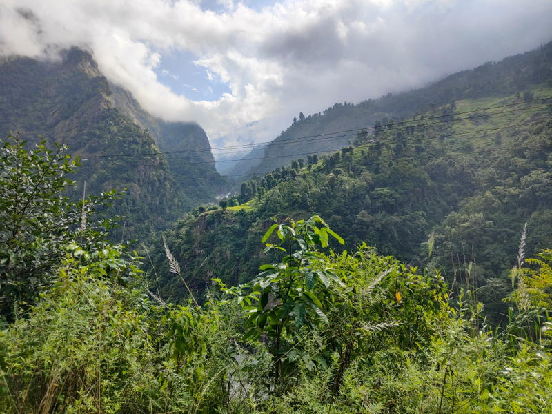 Lush subtropical valley with a river between Soti Khola and Machha Khola on the Manaslu Circuit