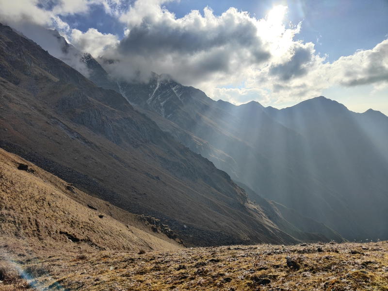 Sunbeams on the high ridge during the descent to Low Camp