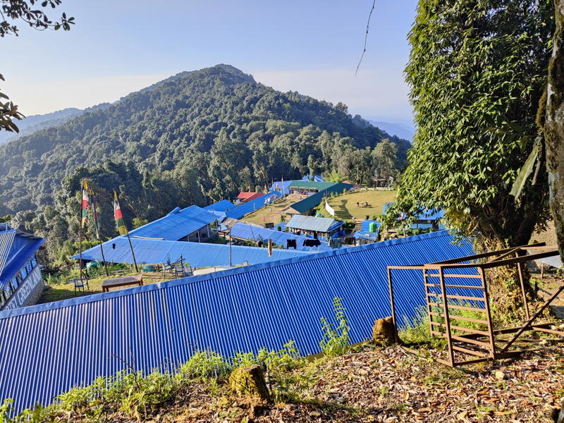 The Green View Hotel and the blue-roofed teahouses at Forest Camp